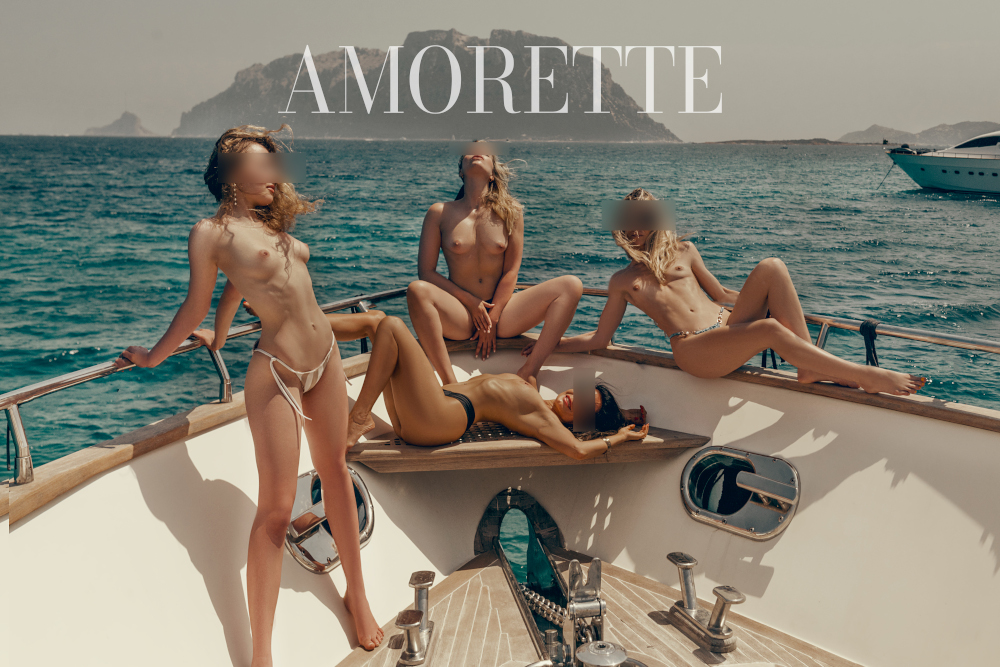 amorette international yachting four half-naked ladies on a boat