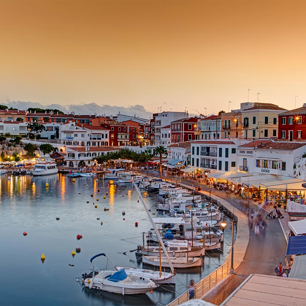 amorette international elite escort agency, high class escort service in menorca, escastell, spain, harbour at the evening, boats, old town by the sea, sea, water, blue sky, summer, vacation, traveling, luxury